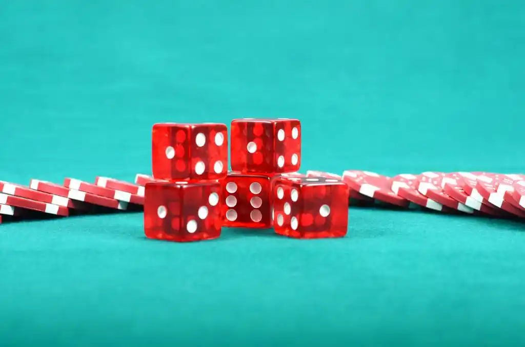 Philippine player watching live baccarat dealer on mobile phone